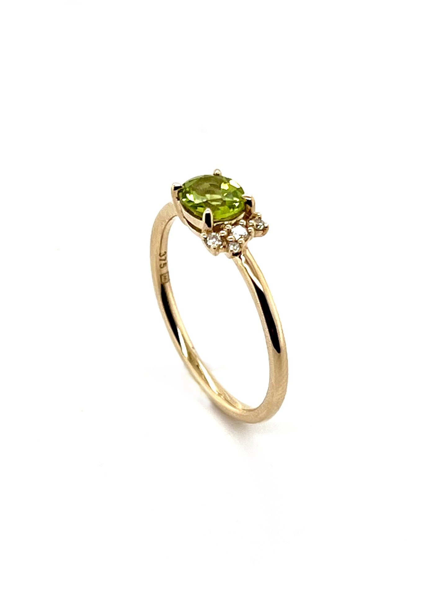 Oval Peridot Claw Set Ring