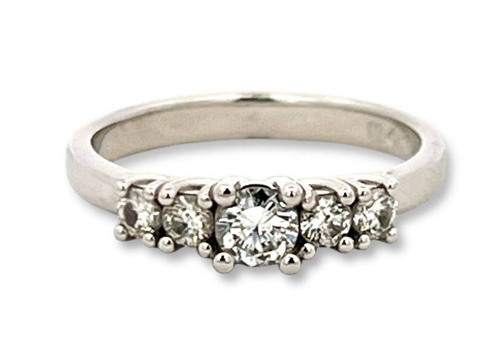 Claw set diamond ring