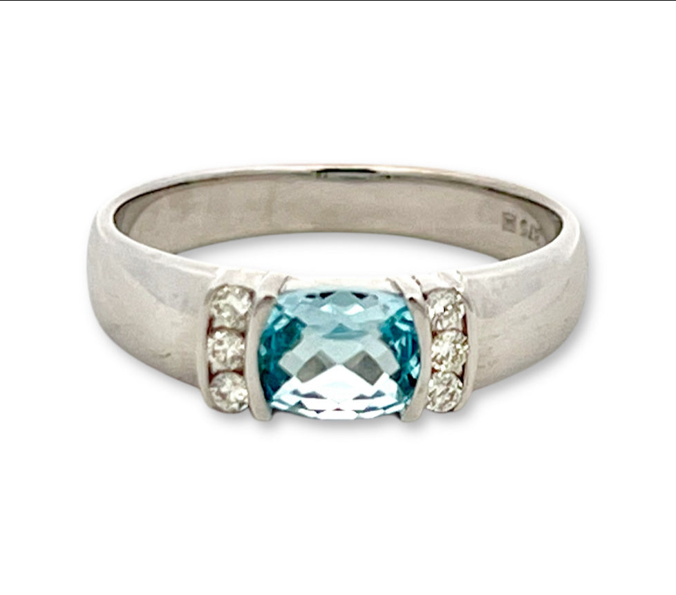 Cushion cut topaz and diamond ring