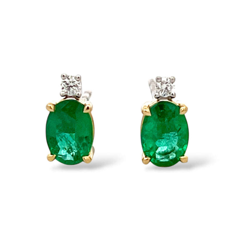Oval natural emerald studs