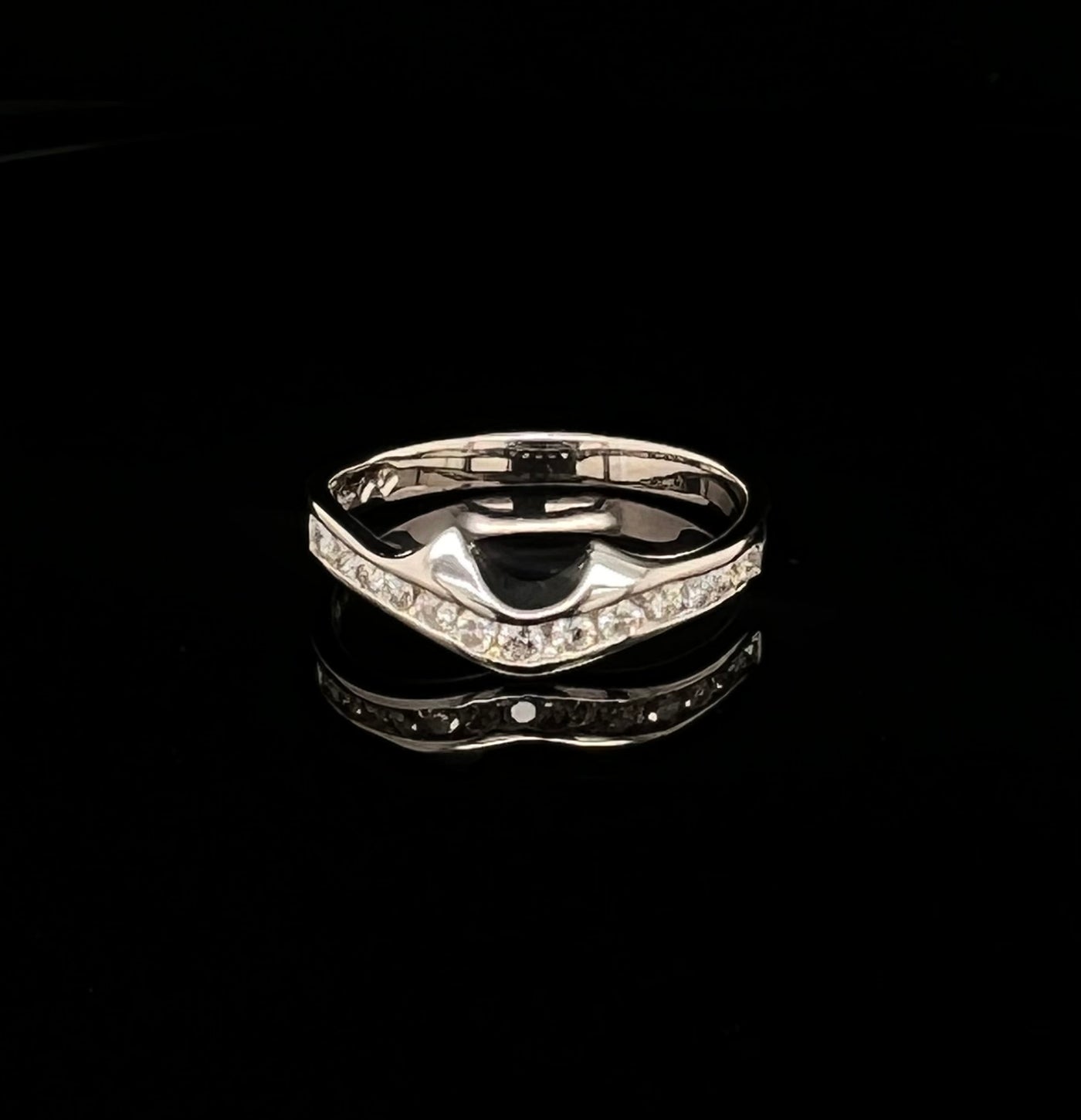 Pear Diamond Ring with a Diamond Band